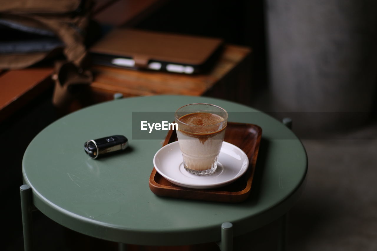 High angle view of coffee cup on table