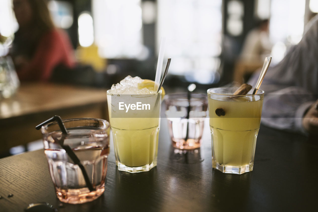 CLOSE-UP OF DRINK ON TABLE