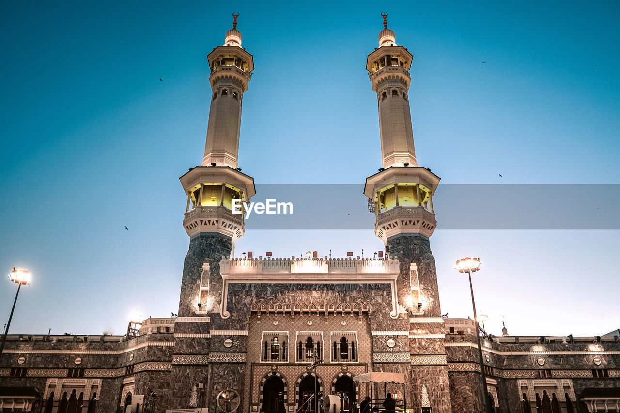 Low angle view of al-haram mosque against sky