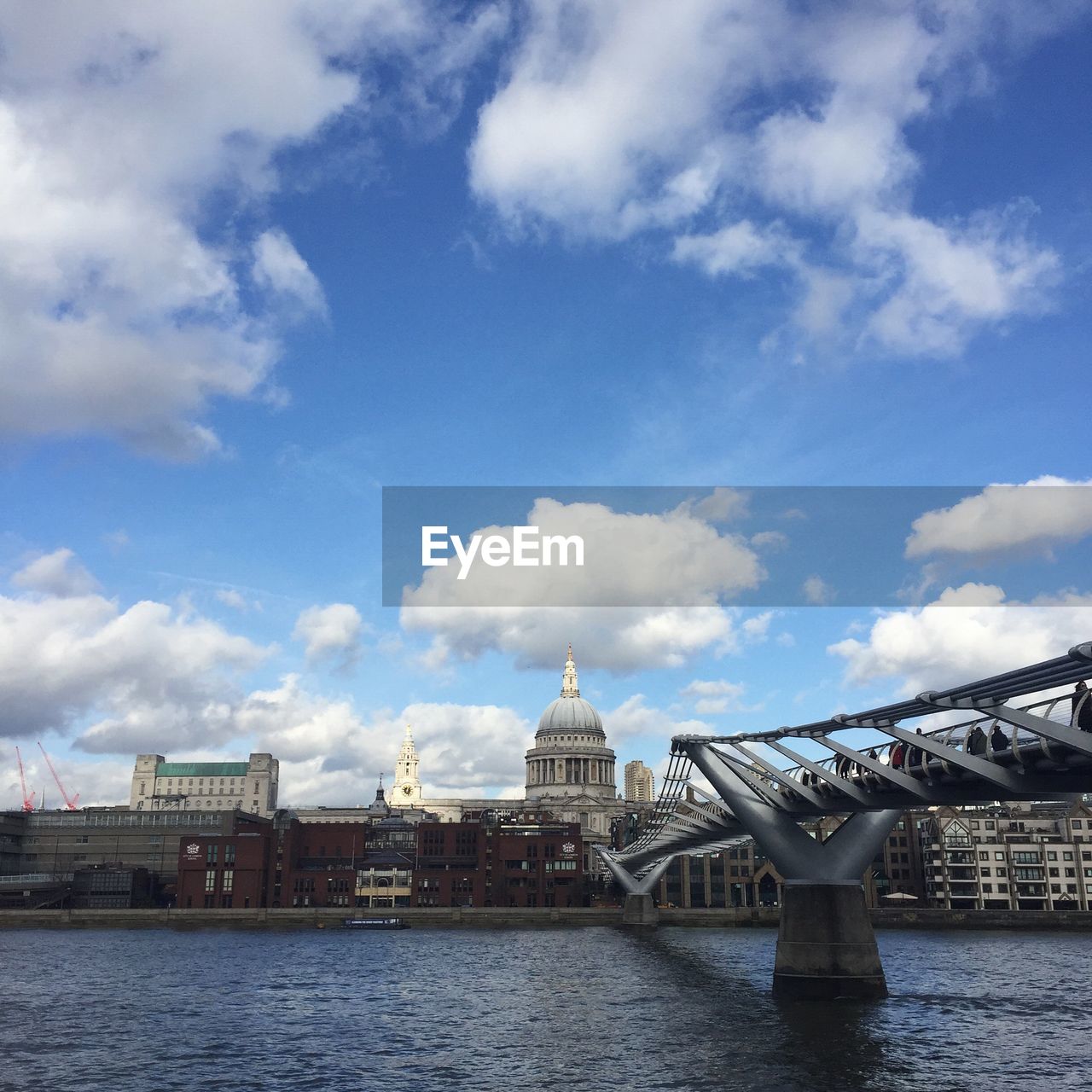 View of city against cloudy sky