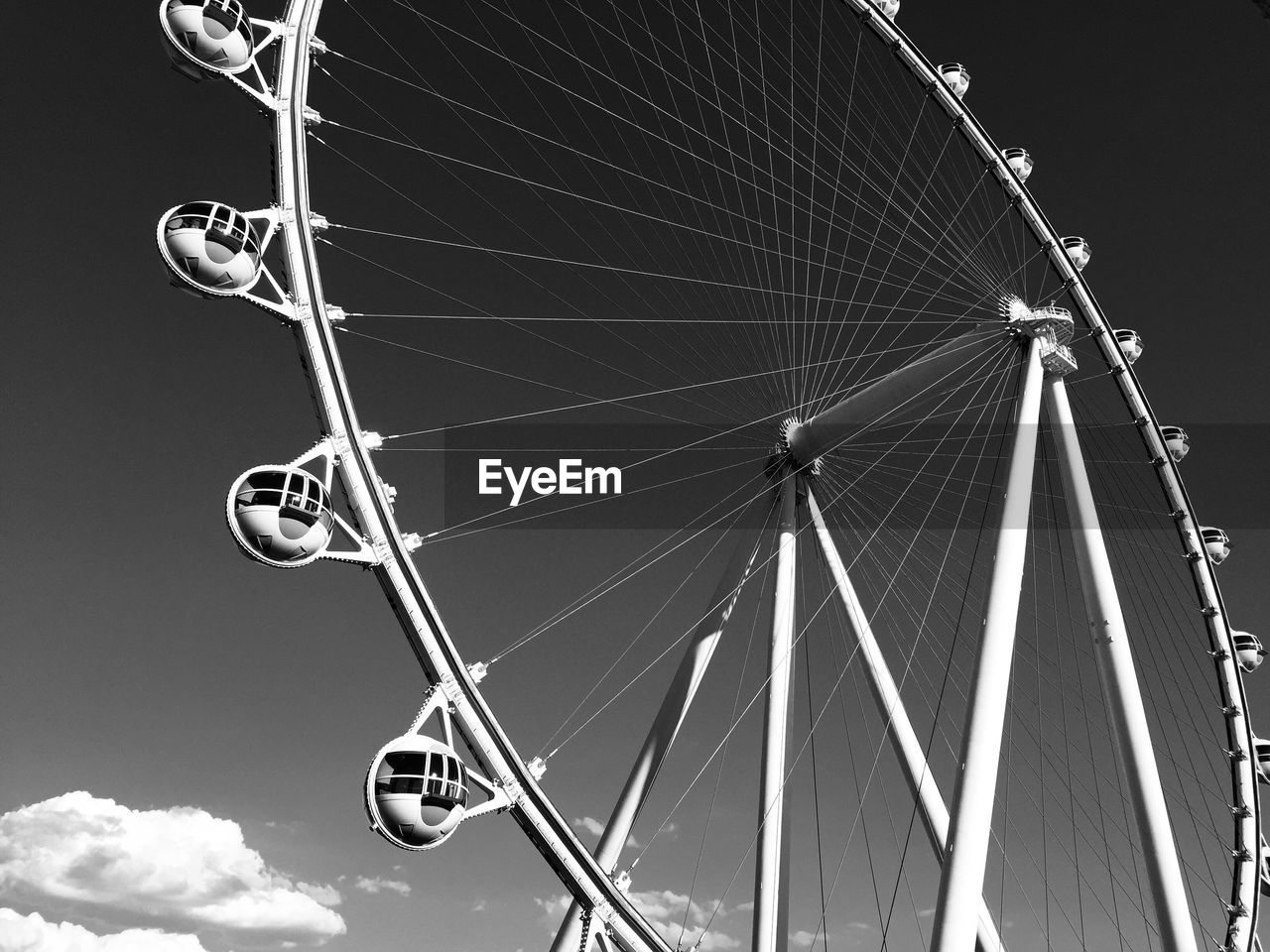 LOW ANGLE VIEW OF FERRIS WHEEL