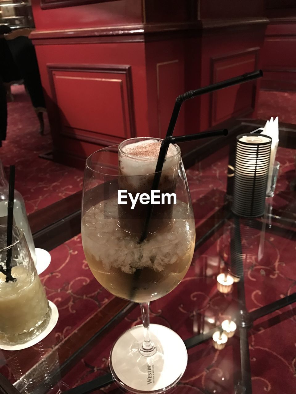 CLOSE-UP OF WINE AND GLASSES ON TABLE