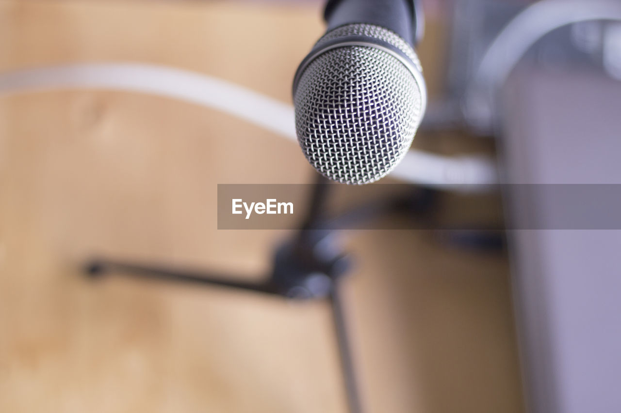 CLOSE-UP OF ELECTRIC FAN ON METAL