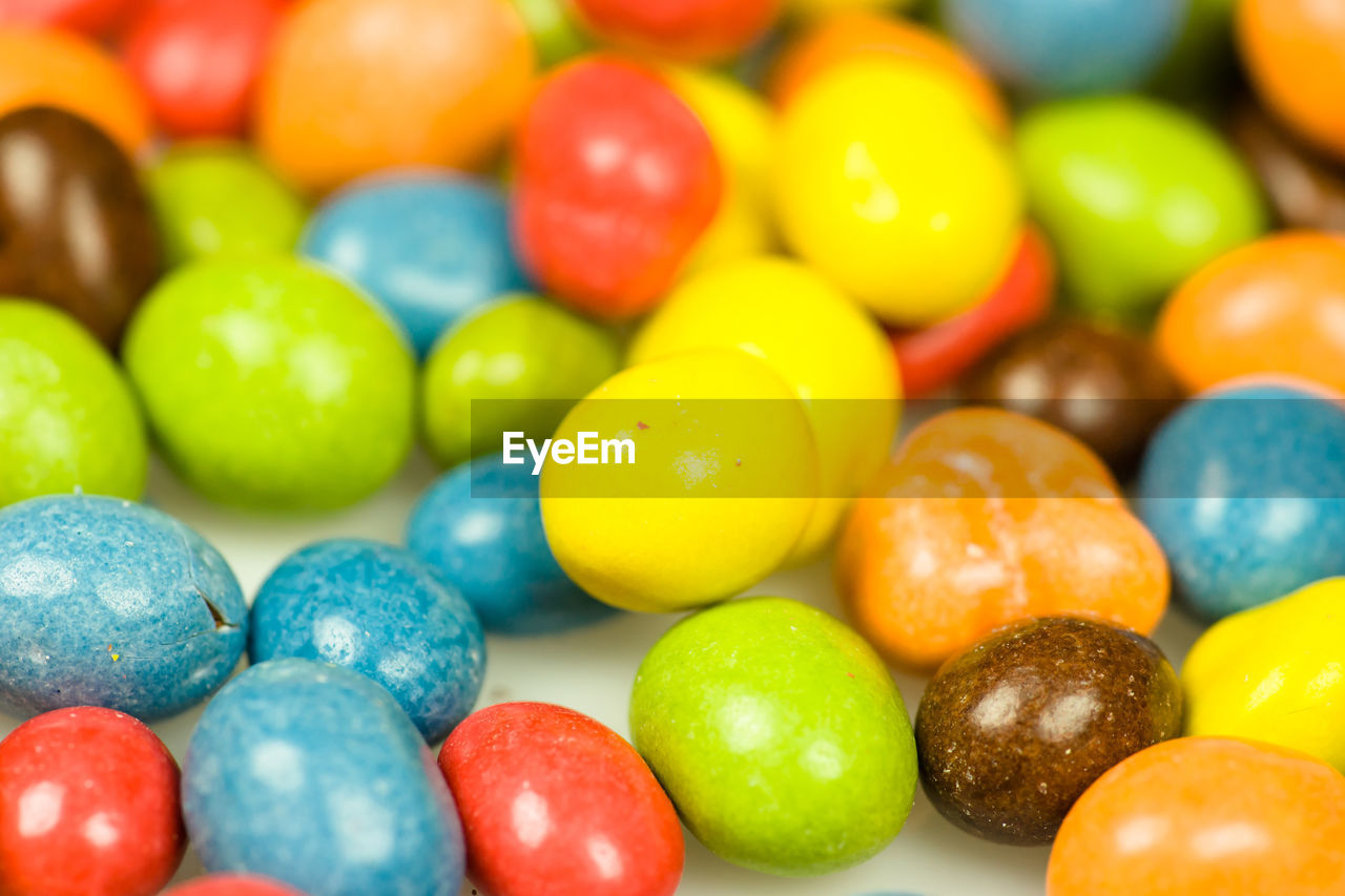 HIGH ANGLE VIEW OF MULTI COLORED EGGS