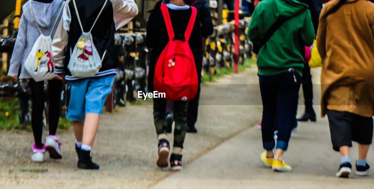 PEOPLE WALKING IN SHOPPING MALL