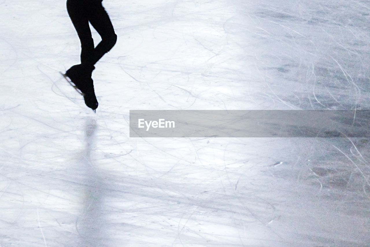 Low section of person on ice skating