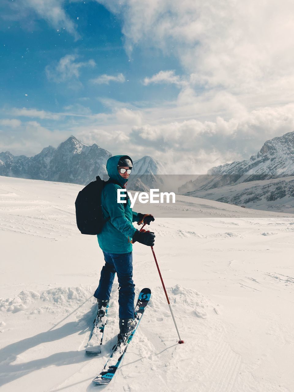 Man skiing on snow covered mountain