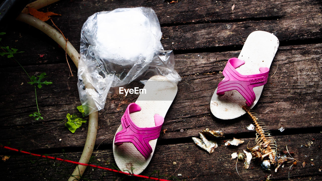 footwear, wood, shoe, spring, pink, no people, high angle view, white, day, still life, nature, outdoors