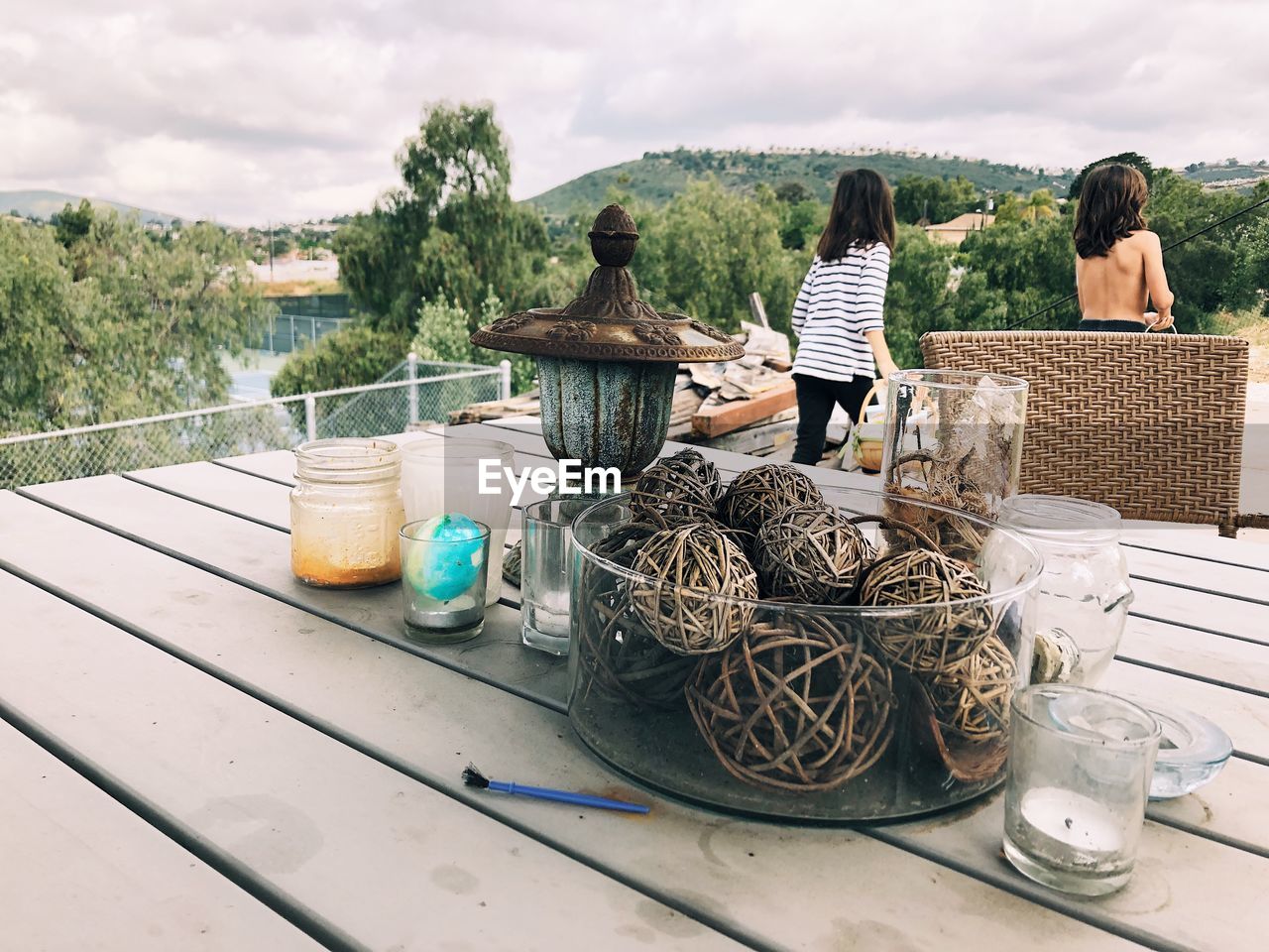 Decorations on table with siblings in background