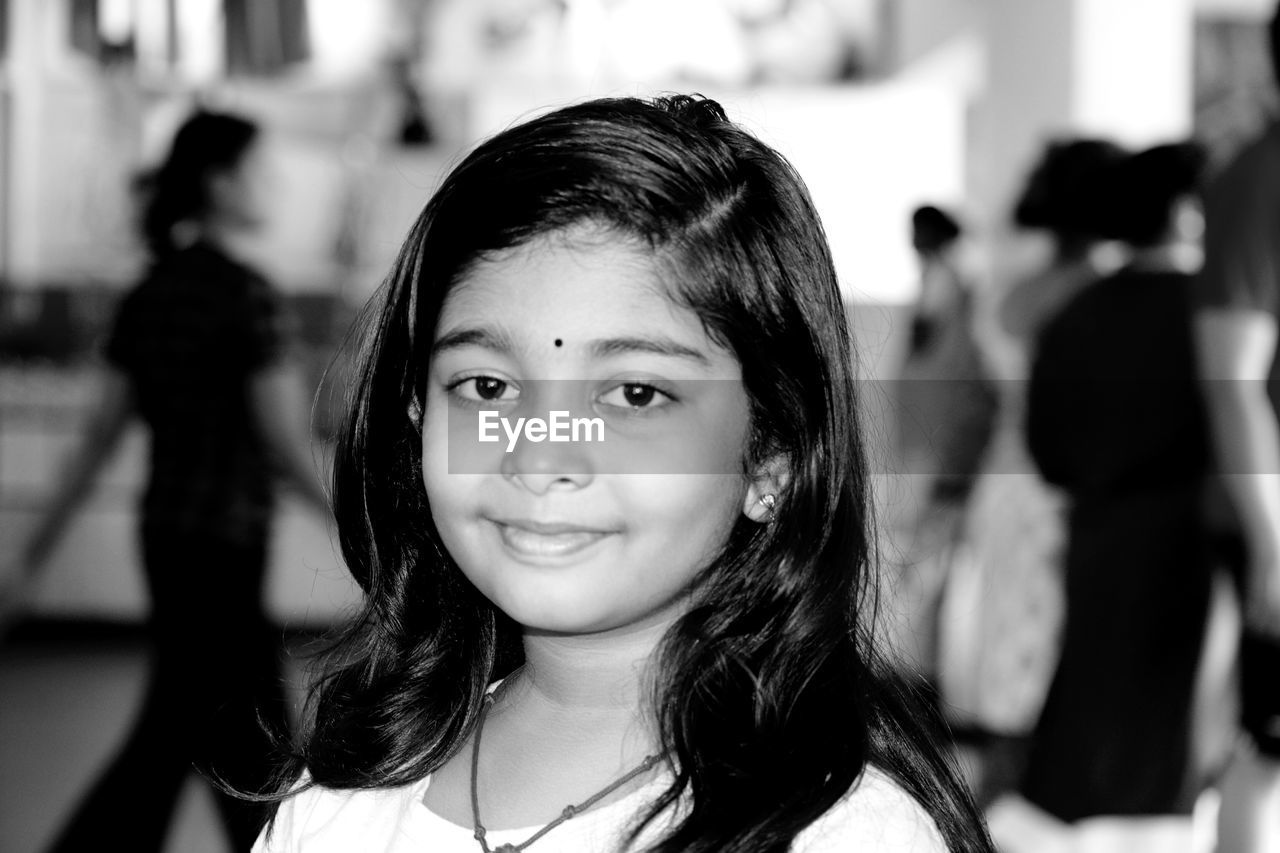 Portrait of smiling girl outdoors