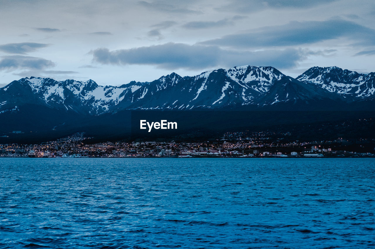 Scenic view of snowcapped mountains against sky during winter