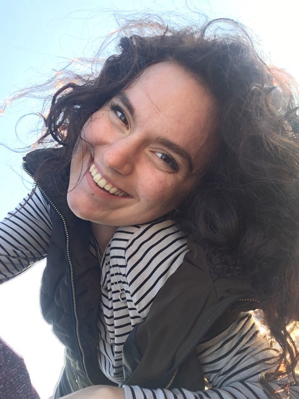 Close-up portrait of cheerful woman