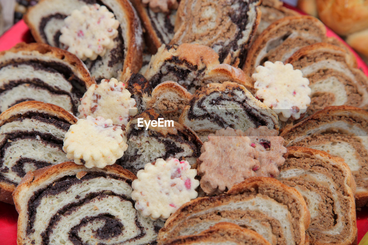 Close-up of poppy seed and walnut rolls during christmas