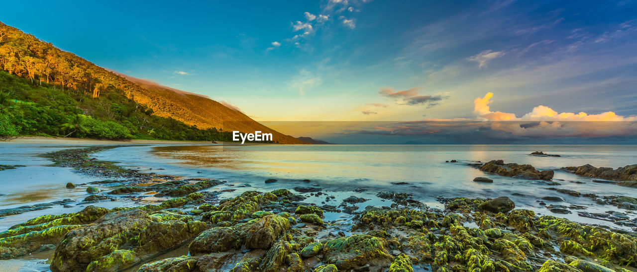 Scenic view of sea against sky at sunset