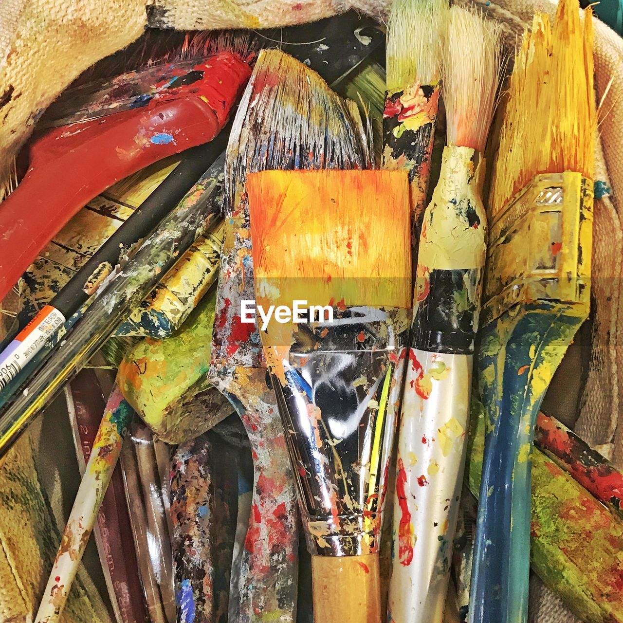 PANORAMIC VIEW OF MULTI COLORED PENCILS IN TRADITIONAL CLOTHING