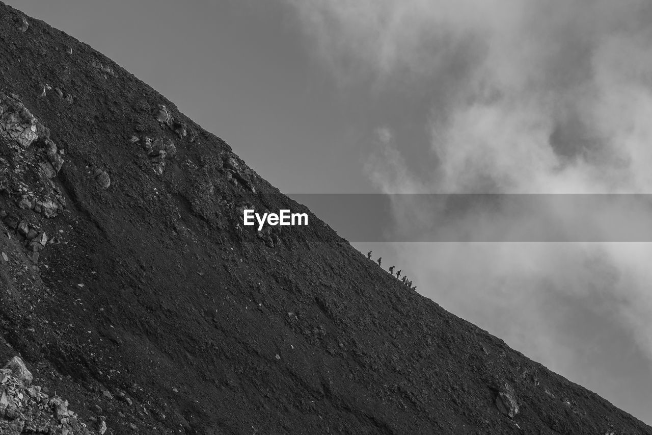 Low angle view of mountain against sky