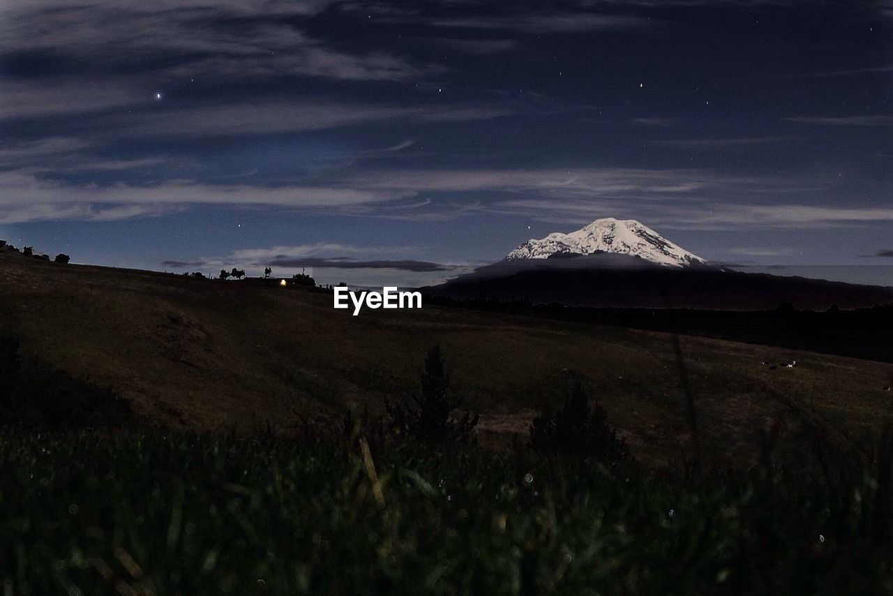 Idyllic view of chimborazo against sky at night