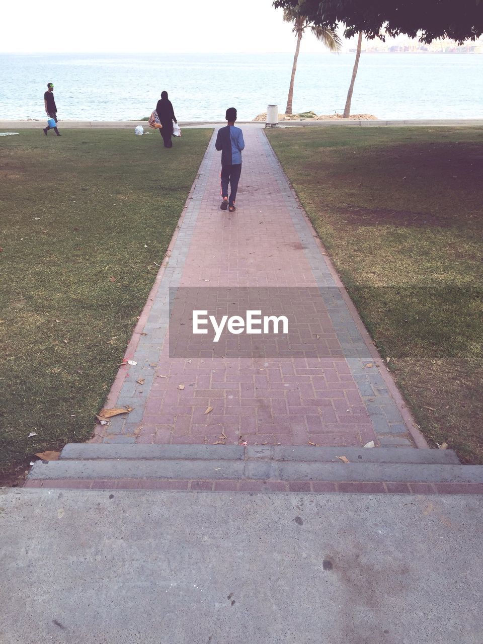 FULL LENGTH OF YOUNG WOMAN