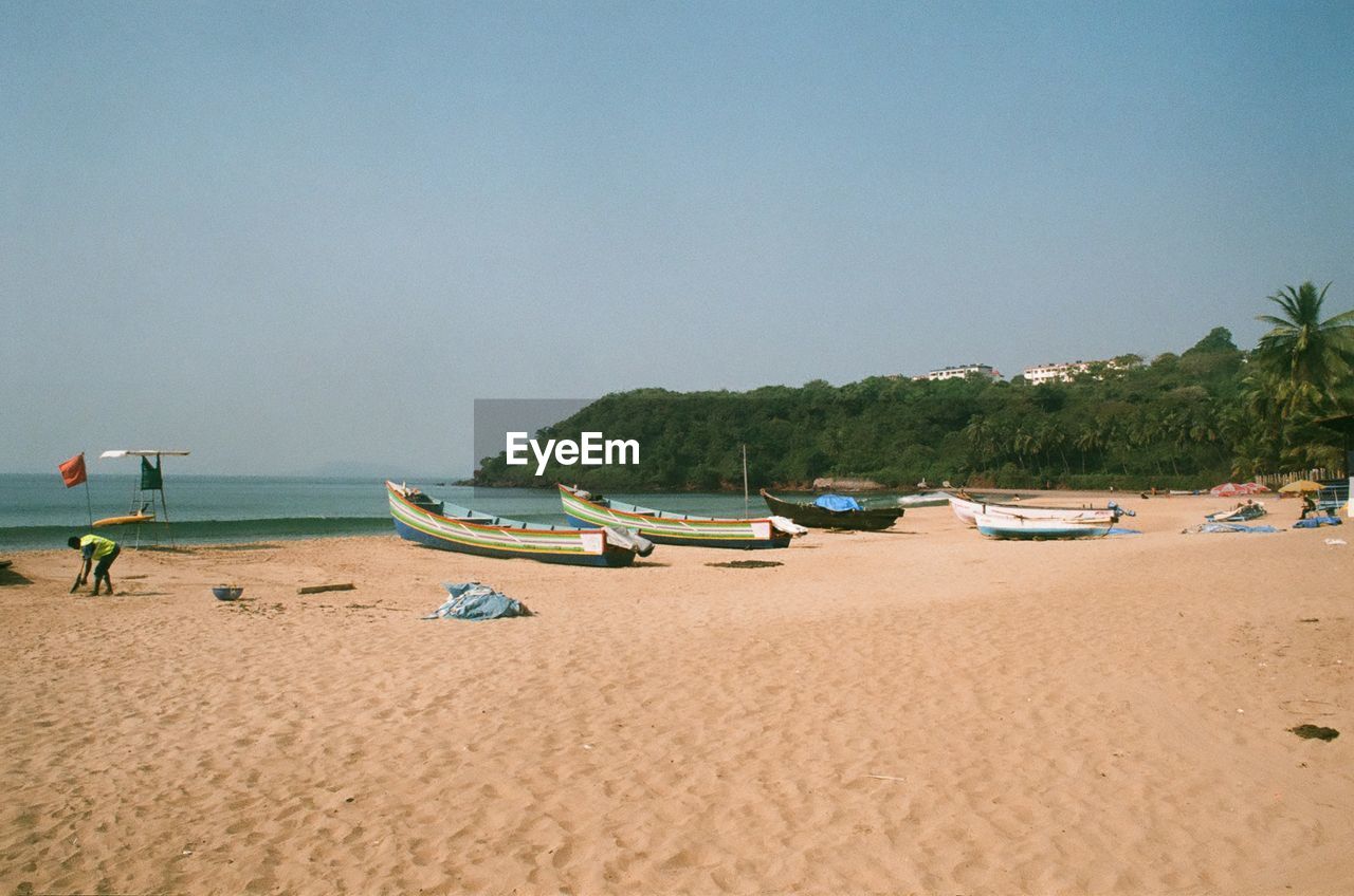 Scenic view of beach against clear sky