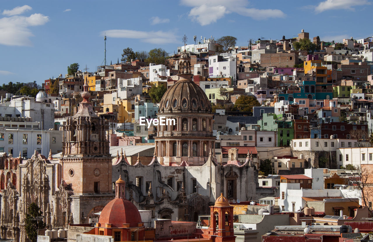 La valenciana or san cayetano church, colorful colonial neighborhood houses in guanajuato, mexico. 