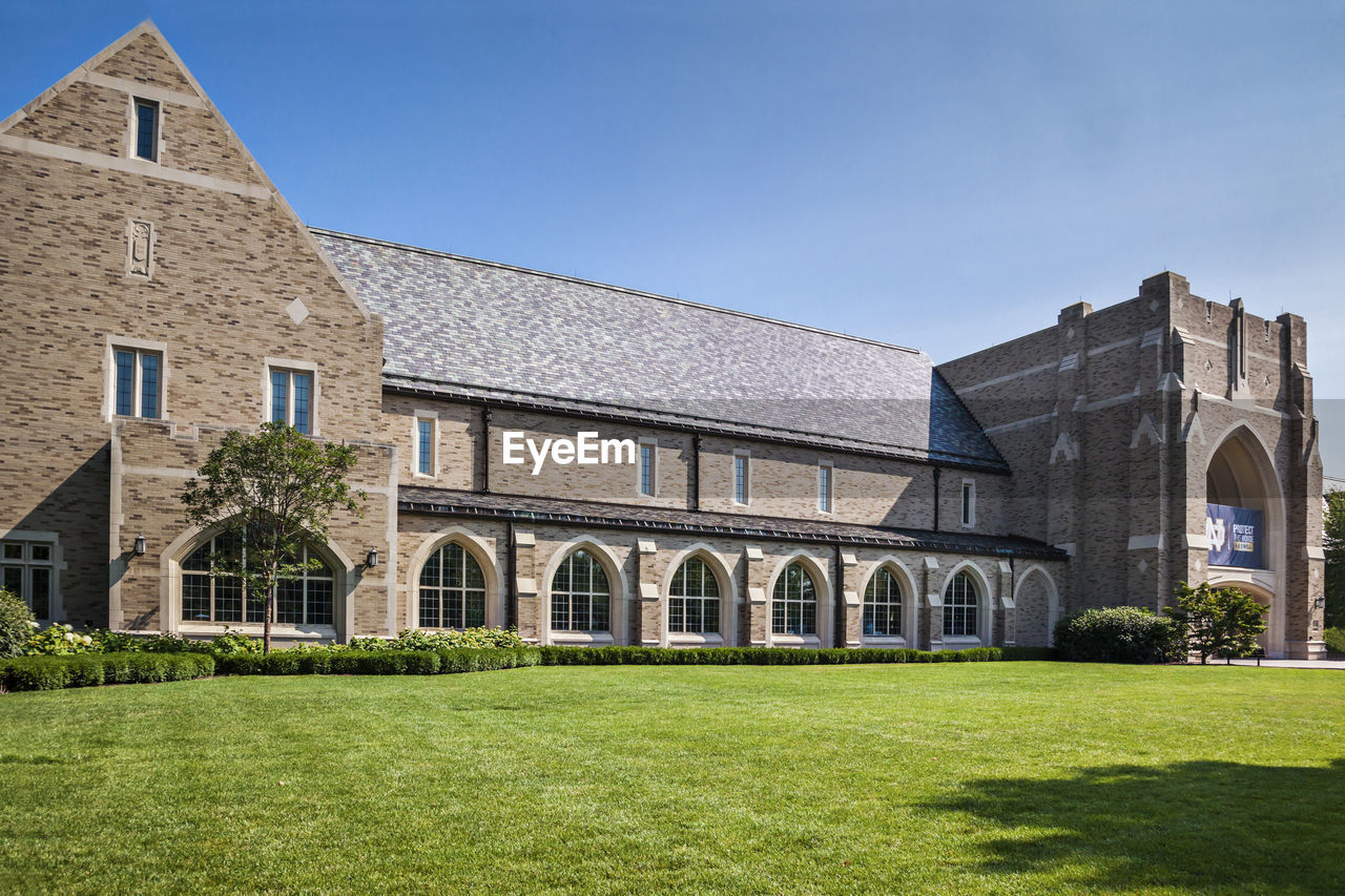 View of building in front of lawn