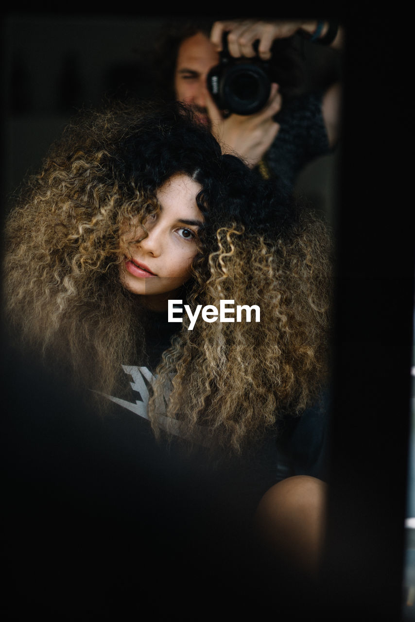 Portrait of young woman with eyes closed
