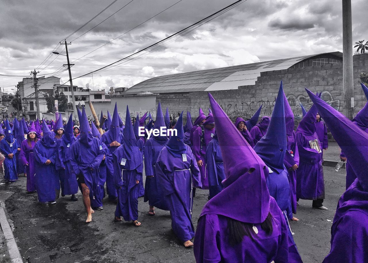 PANORAMIC VIEW OF PEOPLE HANGING ON CLOTHESLINE