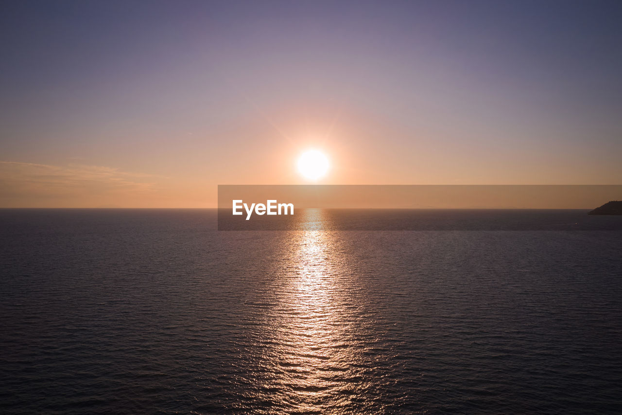 Marine aerial view of the setting sun