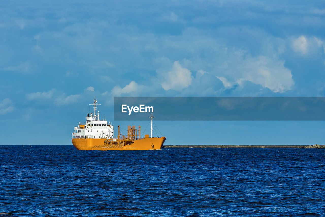 NAUTICAL VESSEL ON SEA AGAINST SKY