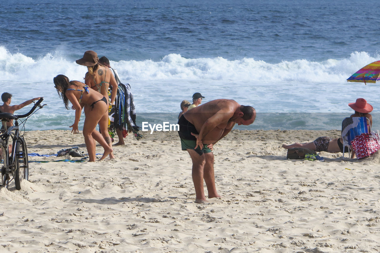 PEOPLE ON BEACH