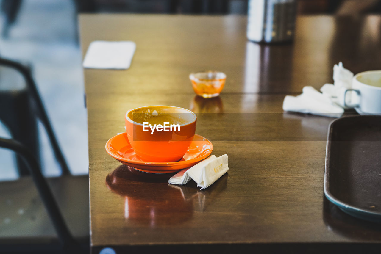 Close-up of coffee cup on table