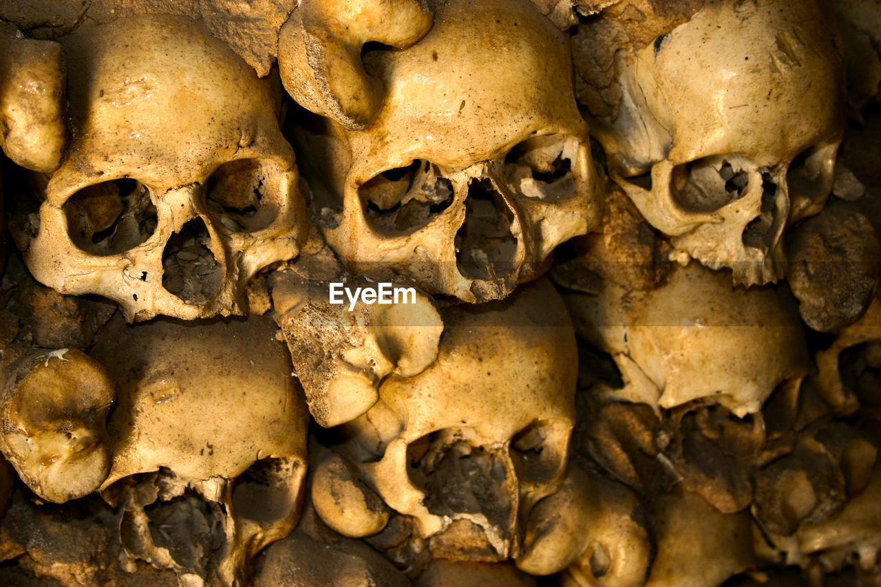 Full frame shot of human skulls at catacombs