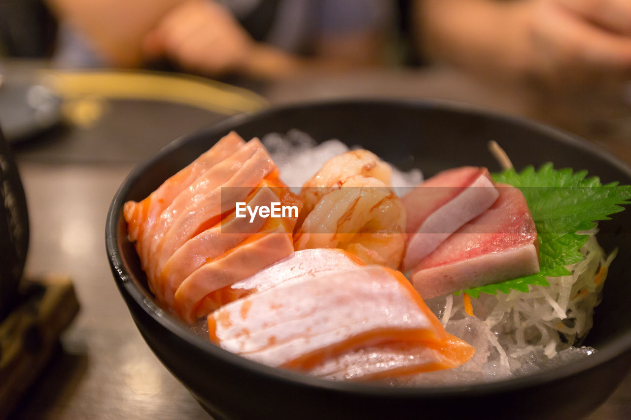 High angle view of fish in plate on table