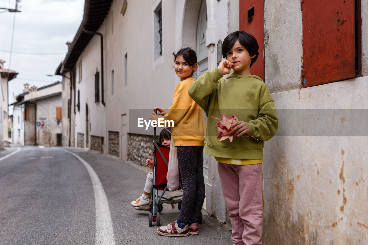 Three girls coming back from shopping