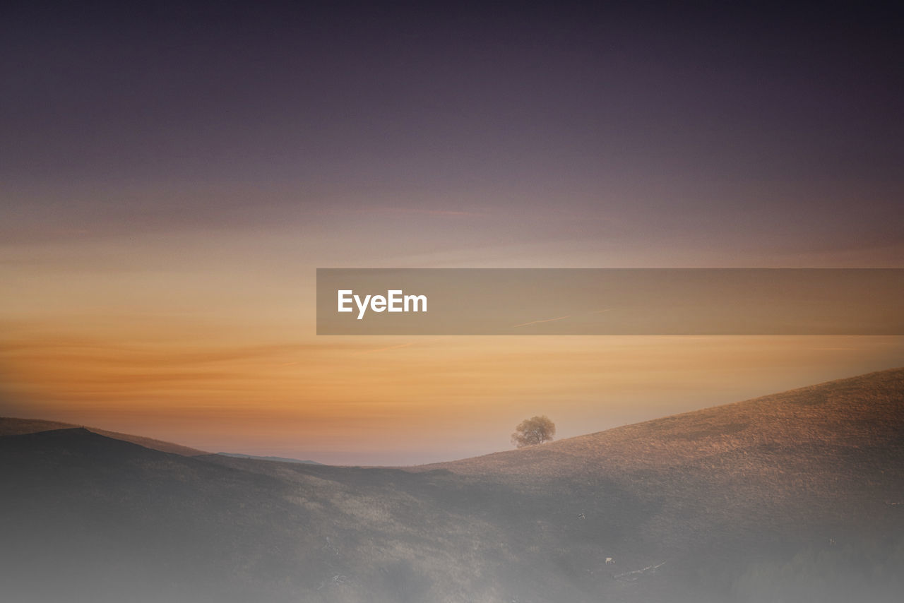 SCENIC VIEW OF SNOW COVERED MOUNTAIN AGAINST SKY