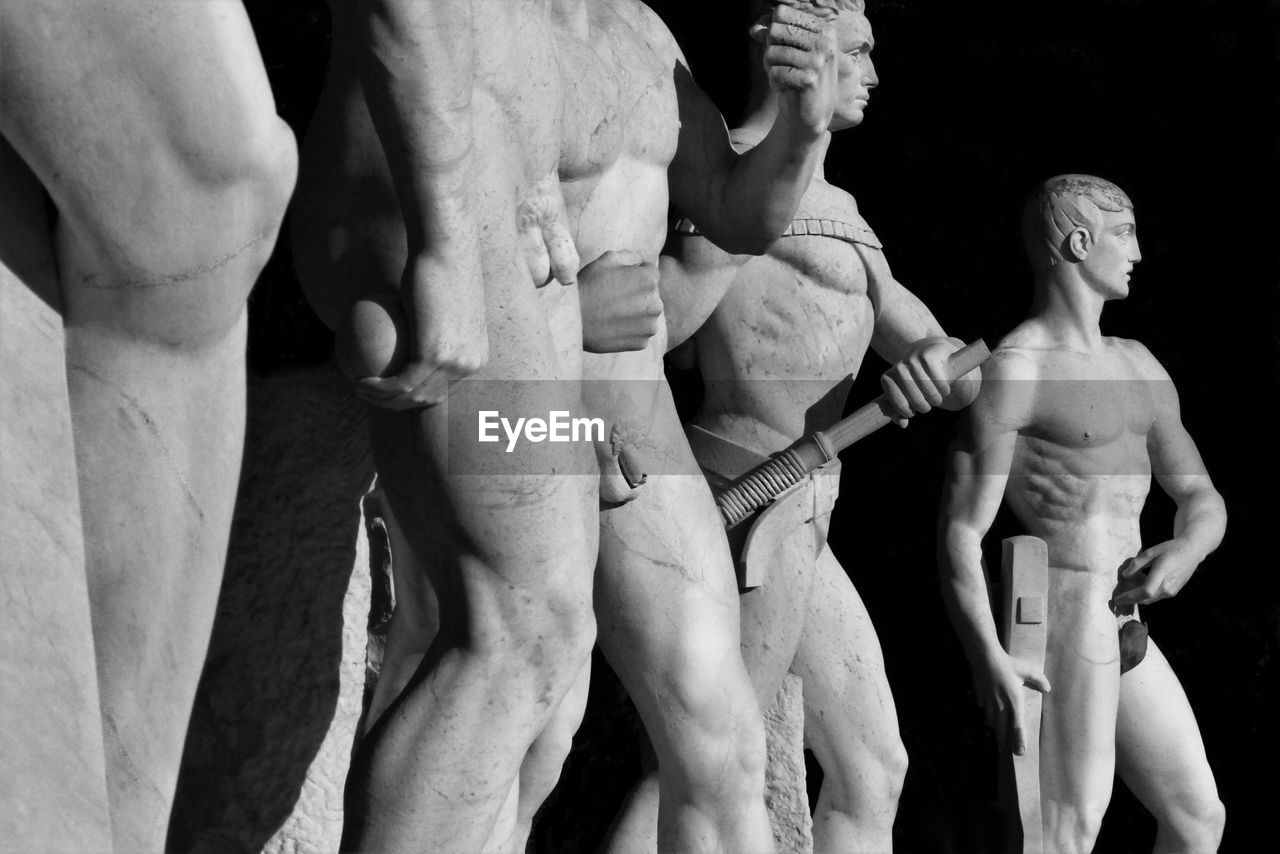 Close-up of male statue at stadio dei marmi. rome