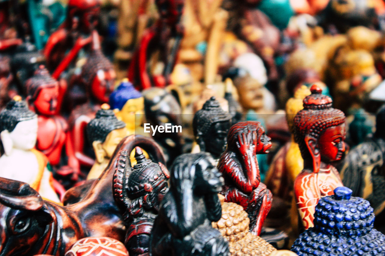 CLOSE-UP OF FIGURINES FOR SALE