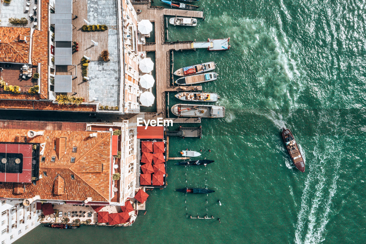 Top down view of moored empty venetian gondolas