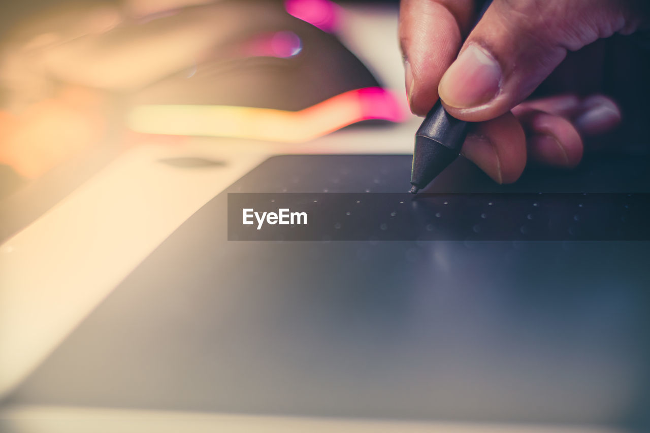 Concept of a digital signature and working business on a tablet in the modern world.