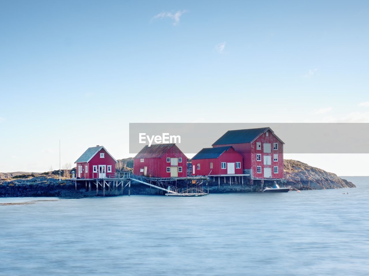 HOUSE BY SEA AGAINST SKY