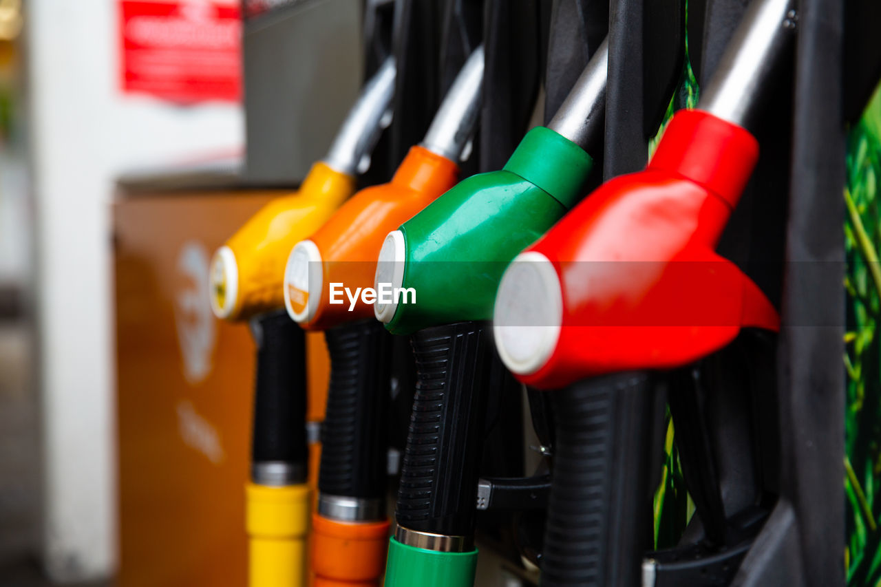Detail of a petrol pump in a petrol up on fuel nozzle in oil dispenser with gasoline 