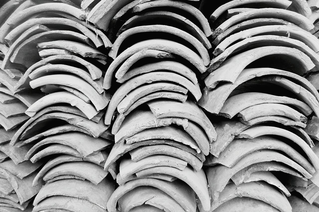 Full frame shot of stacked roof tiles