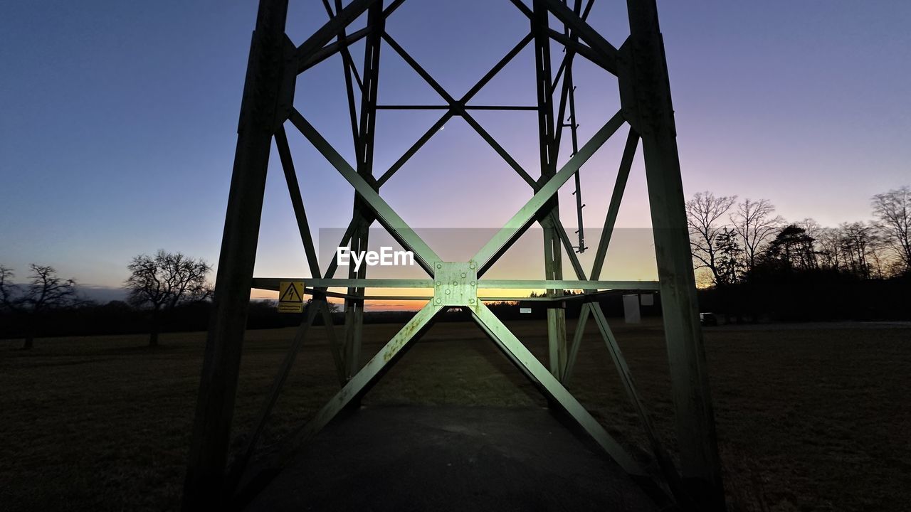 sky, architecture, built structure, nature, sunlight, light, no people, evening, clear sky, silhouette, cloud, sunset, tree, line, outdoors, dusk, reflection, plant, blue, environment, land