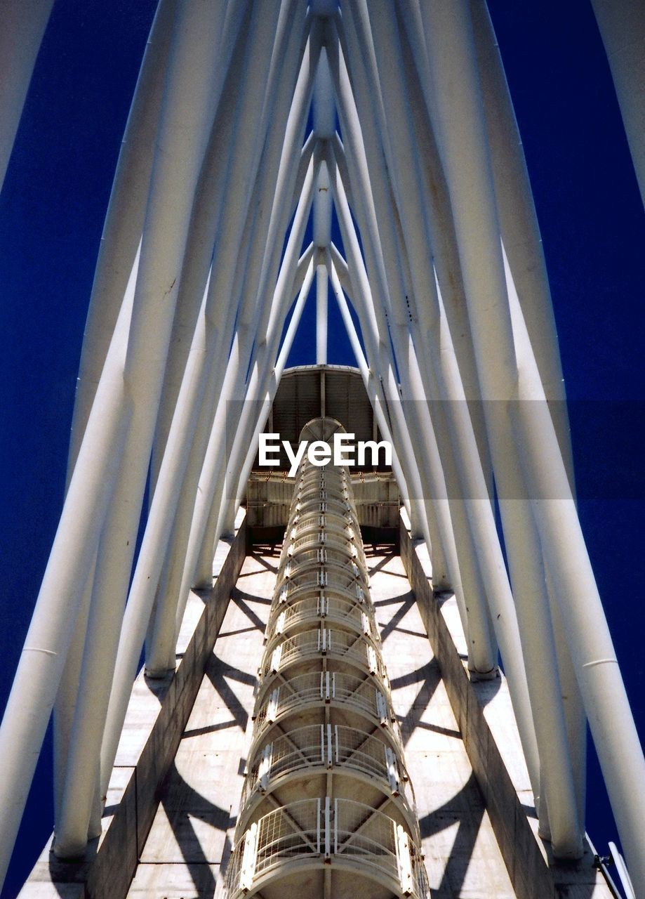 LOW ANGLE VIEW OF METALLIC STRUCTURE AGAINST SKY