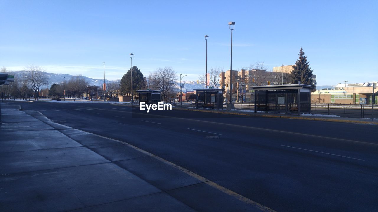 VIEW OF CITY STREET AGAINST SKY