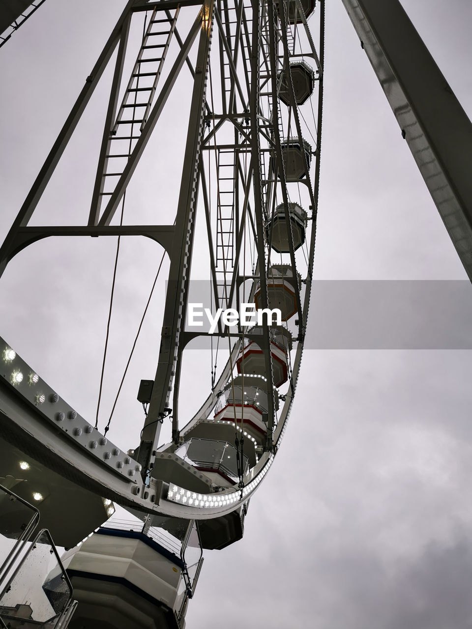 sky, amusement ride, amusement park, architecture, low angle view, amusement park ride, arts culture and entertainment, built structure, roller coaster, nature, cloud, ferris wheel, park, day, outdoors, no people, travel destinations, recreation, city