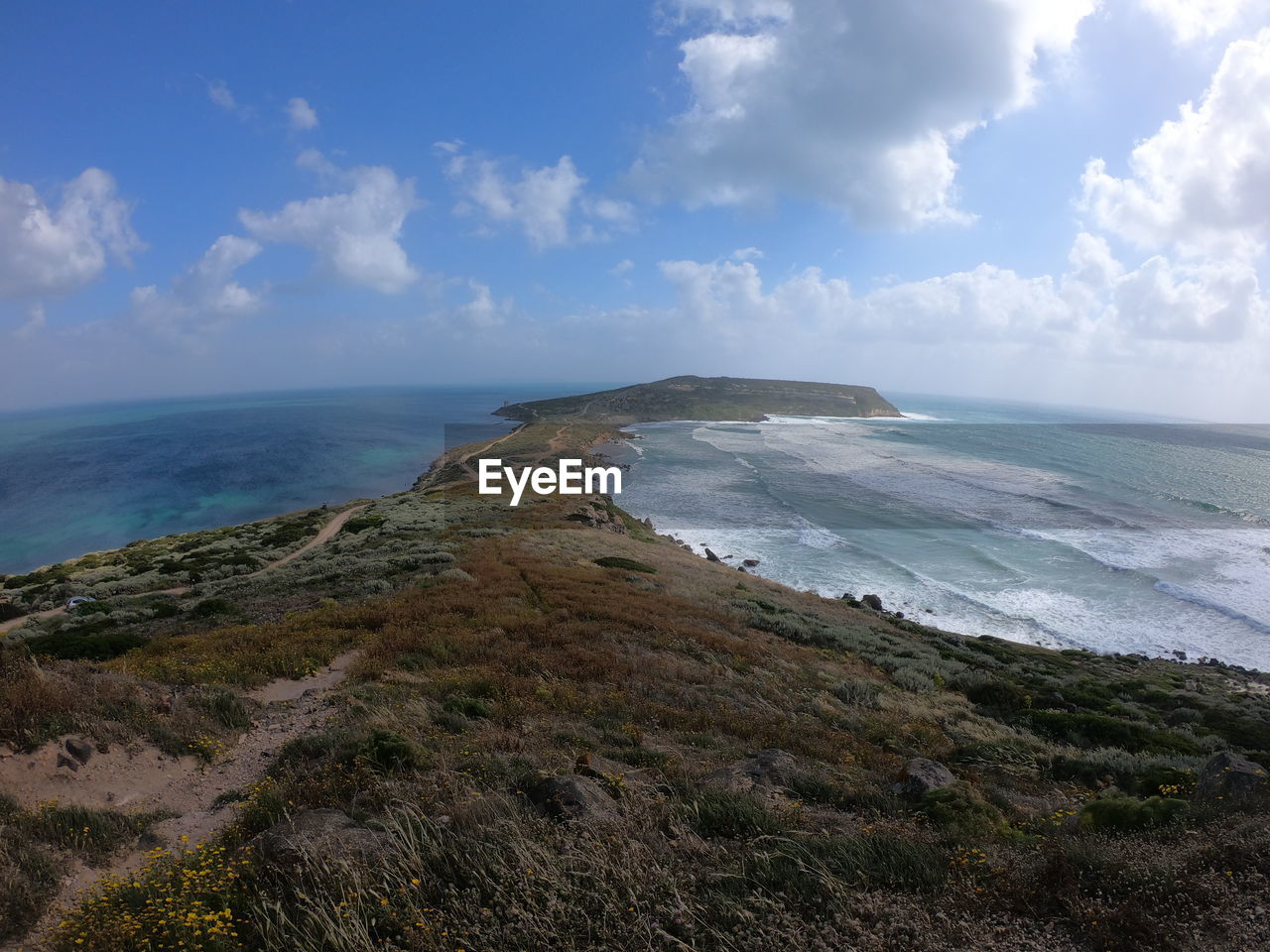 sea, water, sky, land, beach, horizon, ocean, scenics - nature, cloud, beauty in nature, coast, body of water, shore, cliff, nature, rock, horizon over water, environment, coastline, landscape, terrain, travel destinations, no people, wave, travel, tranquility, outdoors, day, tourism, tranquil scene, blue, seascape, motion, cove, sand, sports, water sports, holiday, bay, trip, non-urban scene, vacation, island