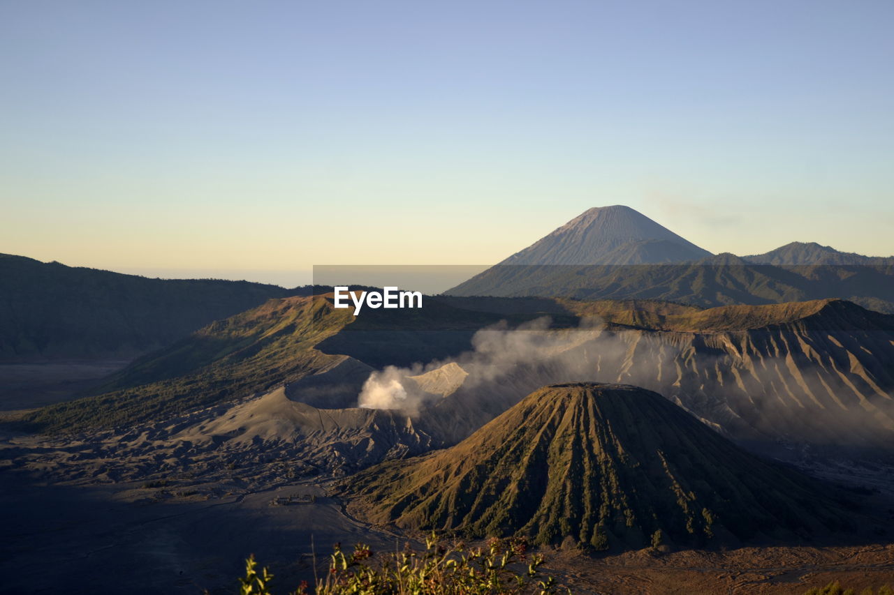 Scenic view of volcanic landscape against sky