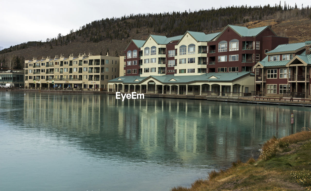 Autumn day in colorado at the keystone resort with water reflections in the lake.