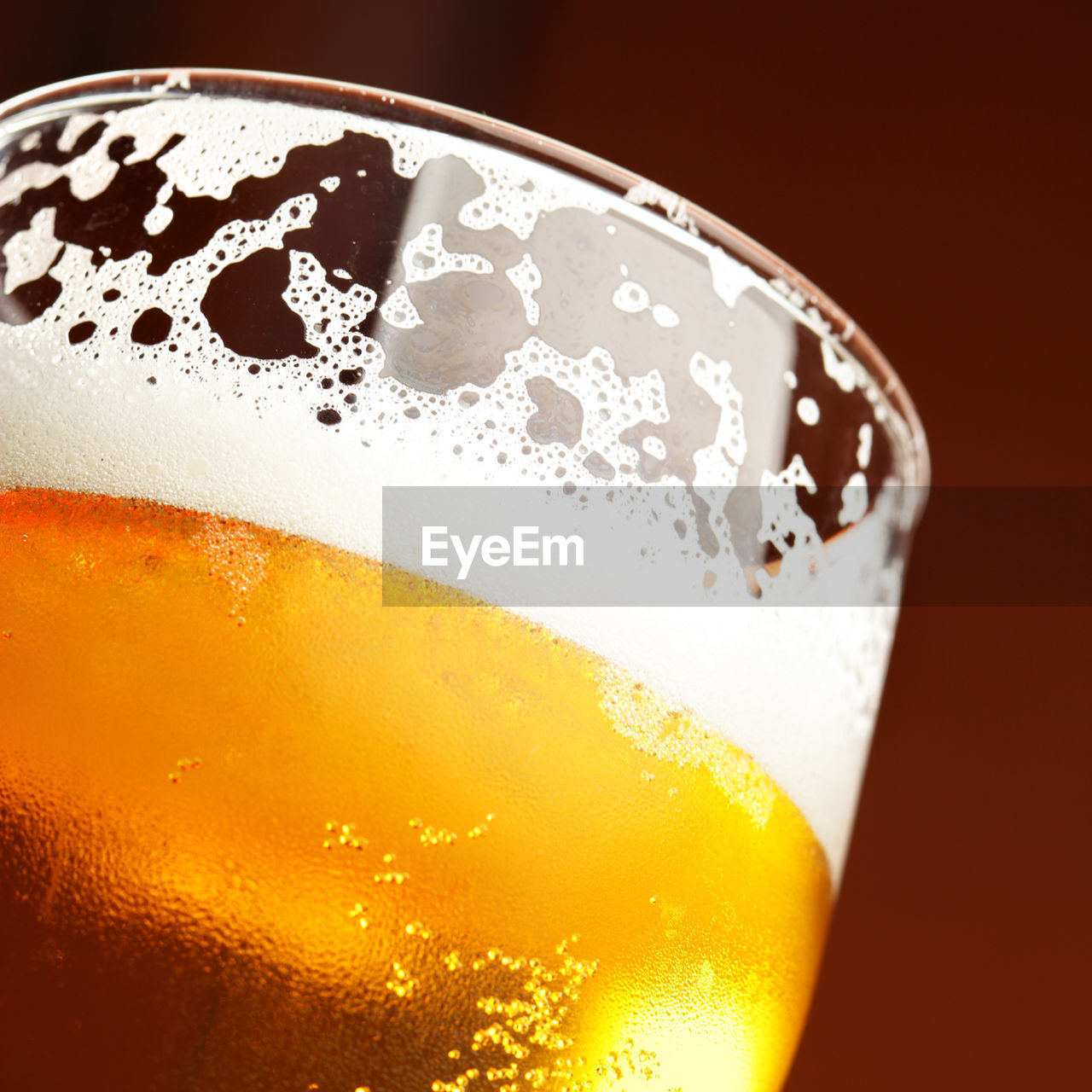 Close-up of beer glass on table